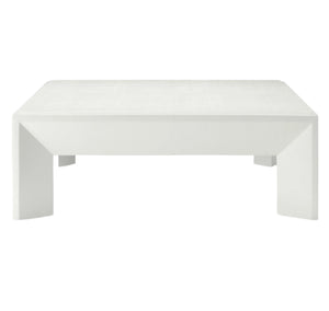 The Roberts Coffee Table by Made Goods is a rectangular, minimalist white table with uniquely shaped legs and a flat top, shown against a plain white background.