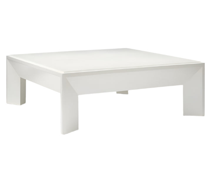The Roberts Coffee Table by Made Goods is a modern square white table with a flat top and thick, uniquely shaped legs, showcased against a plain white background.