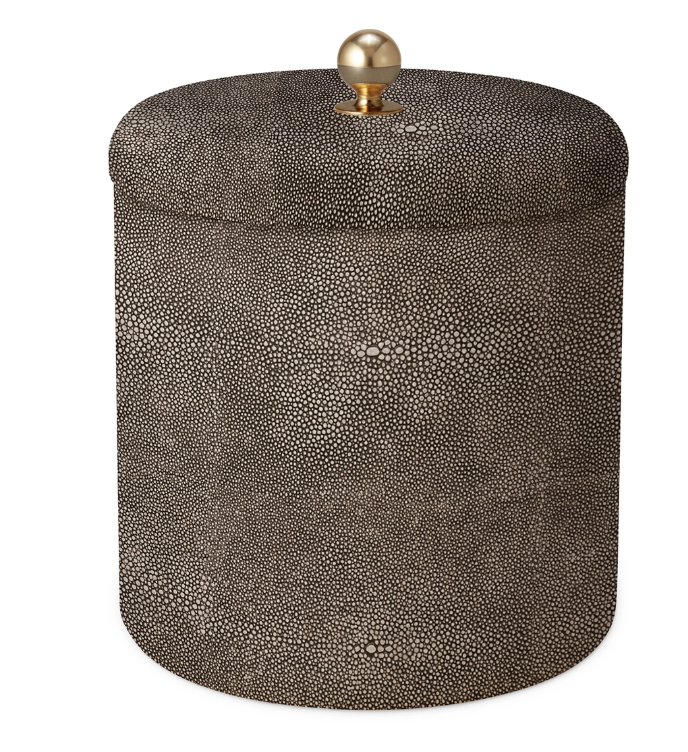 The Aerin Shagreen Ice Bucket in Chocolate features a textured, dark spotted surface, a matching lid, and a gold knob—an elegant cylindrical container inspired by classic design for your barware collection.