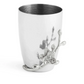 Silver cup with a hammered texture, featuring an embossed branch and flower motif on the side—an elegant addition from the Michael Aram White Orchid Bath Collection that pairs beautifully with other orchid bathroom accessories or the White Orchid Soap Dispenser for a touch of refined luxury.