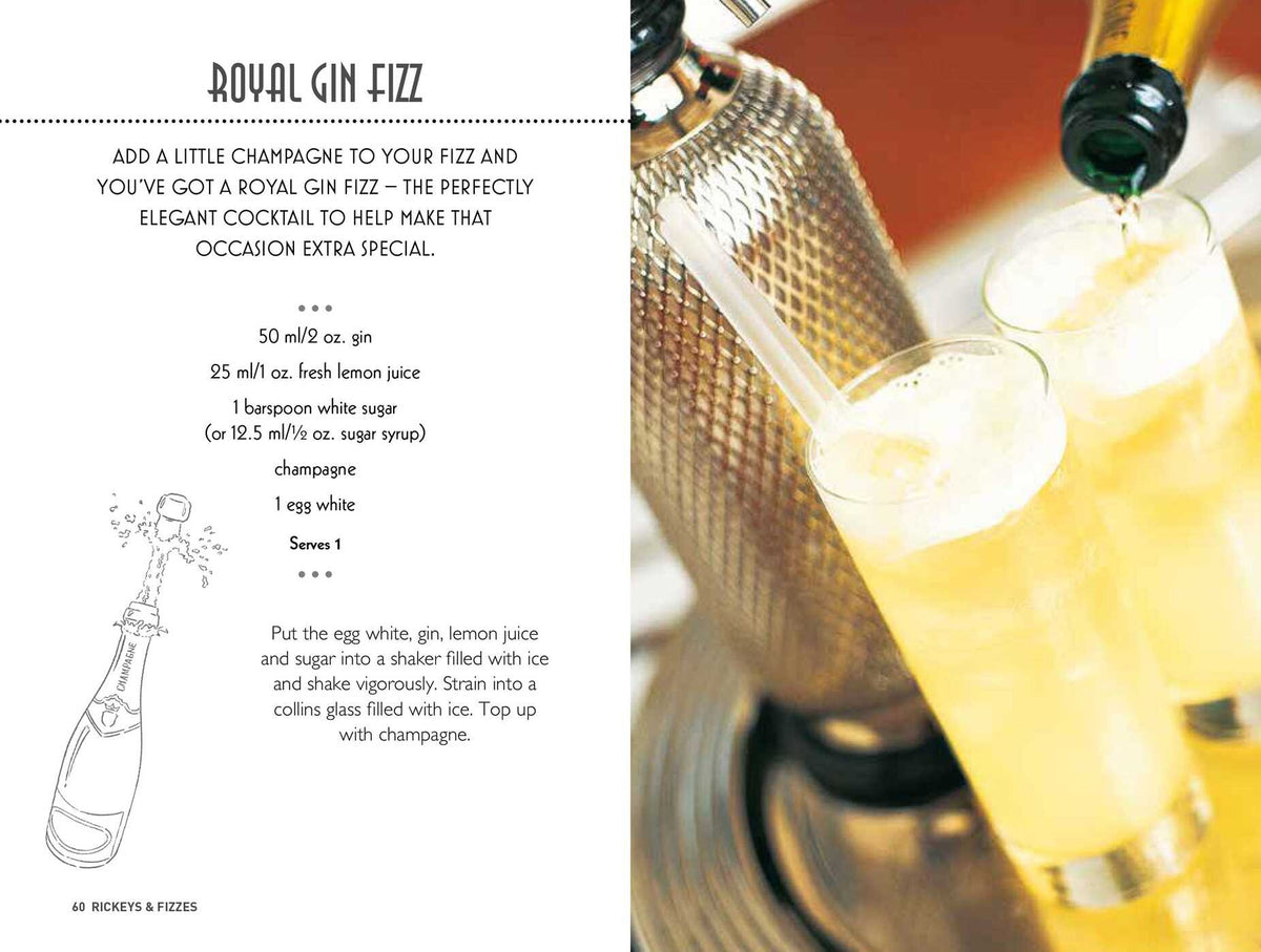 Two tall glasses of royal gin fizz are being filled with a fizzy liquid from a siphon, their tops crowned with foam in a close-up shot. On the left, Gatsby Cocktails by Simon & Schuster features the recipe for this classic Prohibition-era drink, capturing the timeless appeal of 1920s cocktails.