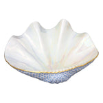 The Reserve Collection Giant Clam by Herend is a white porcelain bowl shaped like a clam shell, with a glossy finish, blue textured base, and gold trim—evoking the elegance of Chinese ceramics admired by Marco Polo.