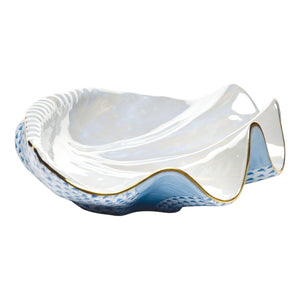 The Herend Reserve Collection Giant Clam is a decorative porcelain bowl with a blue and white exterior, glossy white interior, and gold-trimmed edges—an elegant piece inspired by classic Chinese ceramic artistry.