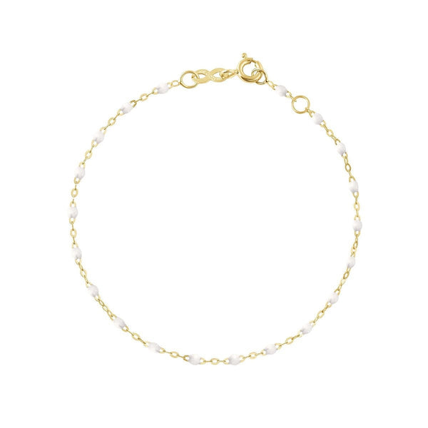 18 carat Yellow Gold Gigi Clozeau Classic Gigi Bracelet, 6.7" with small white beads spaced evenly throughout, isolated on a white background.