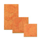 Three napkins from Caspari's Gilded Majolica Coral Collection, in varying sizes and overlapping, feature a leaf pattern on orange—ideal for pairing with disposable tableware at your next gathering.