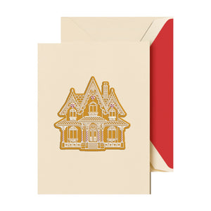 Send warm wishes this season with Crane’s Engraved Gingerbread Cottage Card Set, featuring a gingerbread house design and cream envelopes lined in scarlet. Ideal for anyone who loves boxed holiday greeting cards.