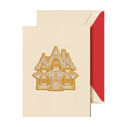 Send warm wishes this season with Crane’s Engraved Gingerbread Cottage Card Set, featuring a gingerbread house design and cream envelopes lined in scarlet. Ideal for anyone who loves boxed holiday greeting cards.