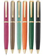 The Graphic Image Leather Wrapped Pen Collection features six ballpoint pens with gold accents and textured grips in pink, brown, teal, orange, green, and black—an ideal gift for anyone who loves a sleek leather-wrapped pen.