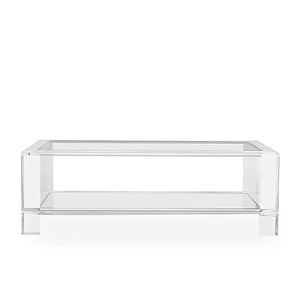 The Surrey Acrylic Rectangular Cocktail Table by Interlude Home features a clear design with a lower shelf, ideal for contemporary living rooms. Shown on a white background.