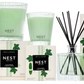 The Nest Cucumber & White Sage Scent Collection, featuring candles, boxes, and a reed diffuser, brings a refreshing wellness fragrance that uplifts any space.