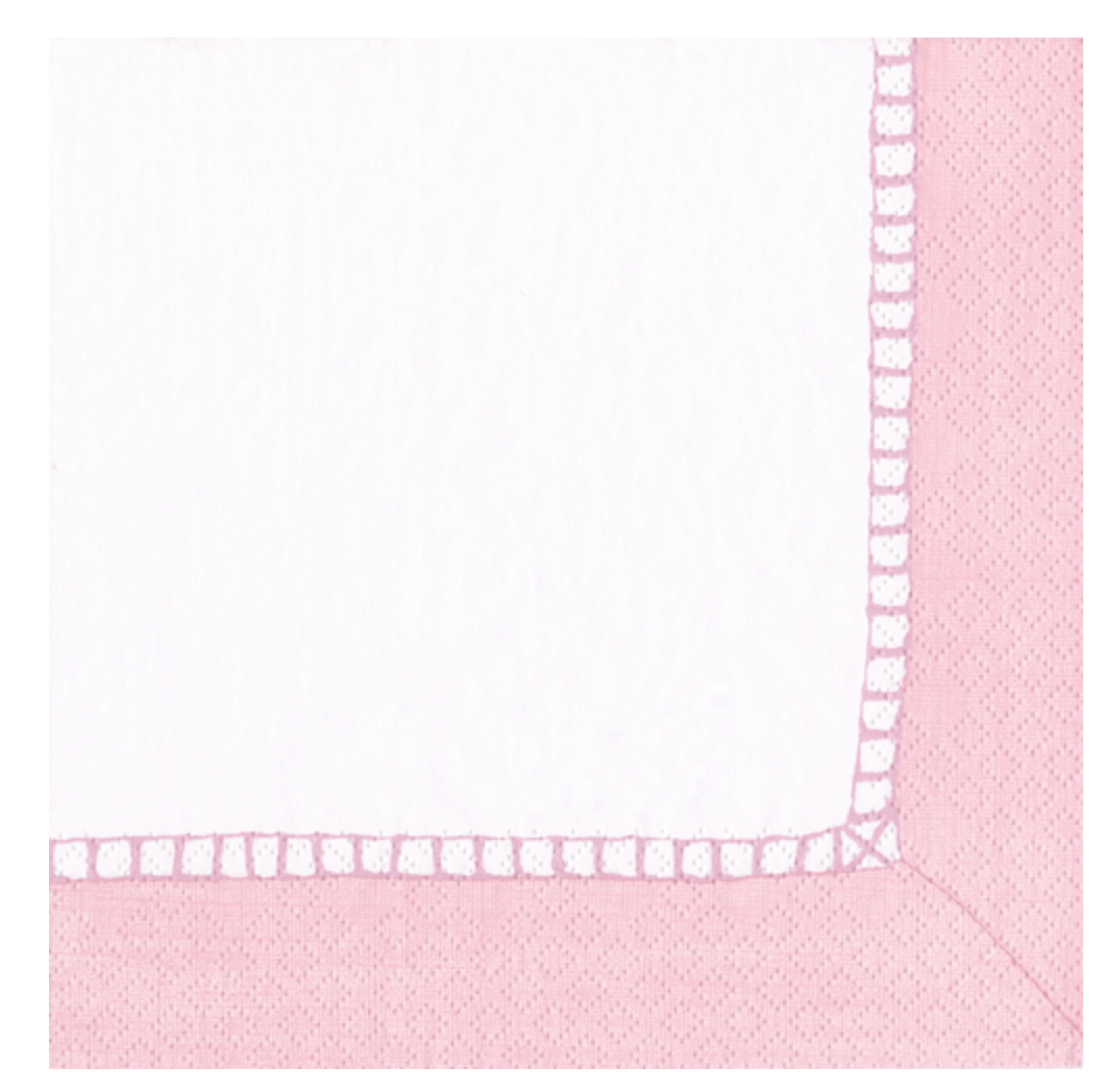 The Caspari Linen Border Petal Pink Collection features a white rectangular cloth with a pink border—perfect for adding charm to your table and elevating your party décor.