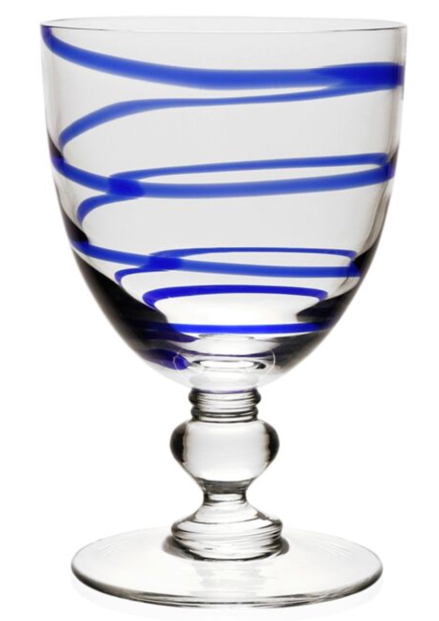 The Bella Blue Collection goblet by William Yeoward Crystal features clear glass, a round base, and a blue spiral detail—an eye-catching addition to any colourful glass or wine glass collection.