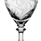 The William Yeoward Crystal Palmyra Collection wine glass features clear crystal with an etched palm tree and foliage design, inspired by Palmyra Atoll’s reefs, set on a short decorative stem and round base.