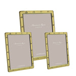 The Gold Locket Frame Collection by Addison Ross includes three gold-plated frames with studded edges and velvet backstands. Each comes beautifully gift boxed, making them perfect for any occasion. Placeholder text reads "Addison Ross London.