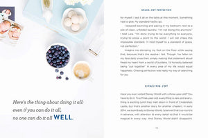 The open book "Grace Not Perfection" by Thomas Nelson lies elegantly on the table amidst blueberries, a coffee mug, a napkin, and a flower arrangement—a serene scene to simplify your life.