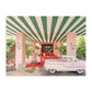 The Gray Malin 500 Piece Puzzle, The Dogs at the Beverly Hills Hotel by Chronicle Books, features a vintage pink car and luggage cart under a green and white striped canopy at a hotel entrance surrounded by lush tropical plants. It evokes the charm of fine art photography.