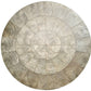The Kim Seybert Capiz Placemat features a segmented, mosaic-style design in metallic silver and gray rings—an elegant round accent ideal as a striking table backdrop or stylish placemat for your dining setting.