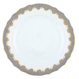 A Herend Fish Scale Gray Collection porcelain plate by Herend, with a scalloped edge and an intricate hand-painted pattern in grey and gold around the rim.