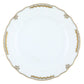 Herend’s Princess Victoria Gray Collection features a white porcelain plate with a scalloped rim, elegant gold trim, and subtle hand-painted leaf motifs inspired by Queen Victoria’s classic designs.