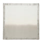 The Kim Seybert Dip Dye Napkin Set features a square fabric with a gradient design from white to beige and is bordered by metallic foil trim.