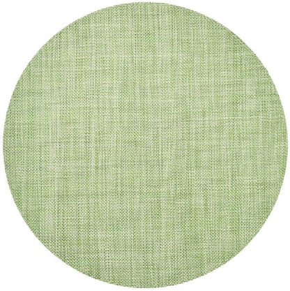 The Kim Seybert Portofino Placemat features a light green woven vinyl texture, viewed from above on a white background. Stylish and easy to clean, it brings a fresh touch to any table setting.