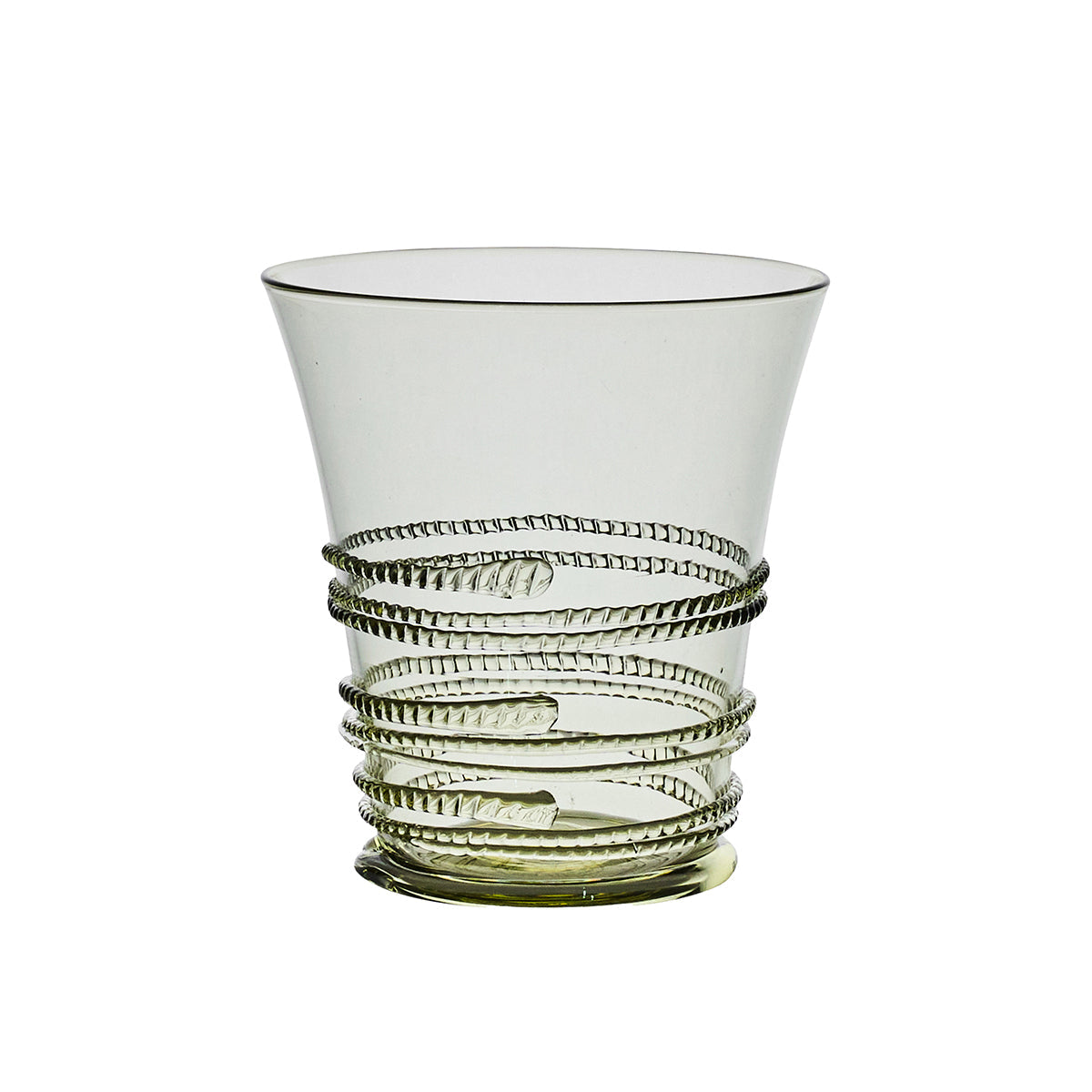 Part of Juliska’s Ella Drinkware Collection, this clear glass tumbler features a flared rim and decorative spiral ridges wrapping around the lower half, showcasing the brand’s signature mouth-blown glassware craftsmanship.