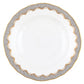 A white ceramic plate from the Herend Fish Scale Gray Collection, featuring a scalloped gold and silver patterned edge, showcases artistic appreciation reminiscent of classic Herend porcelain.