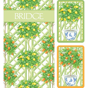 Caspari's Citrus Topiaries Bridge Collection features illustrations of citrus trees with green leaves and yellow-orange fruits in pots, set against a lattice background and labeled "BRIDGE" at the top.