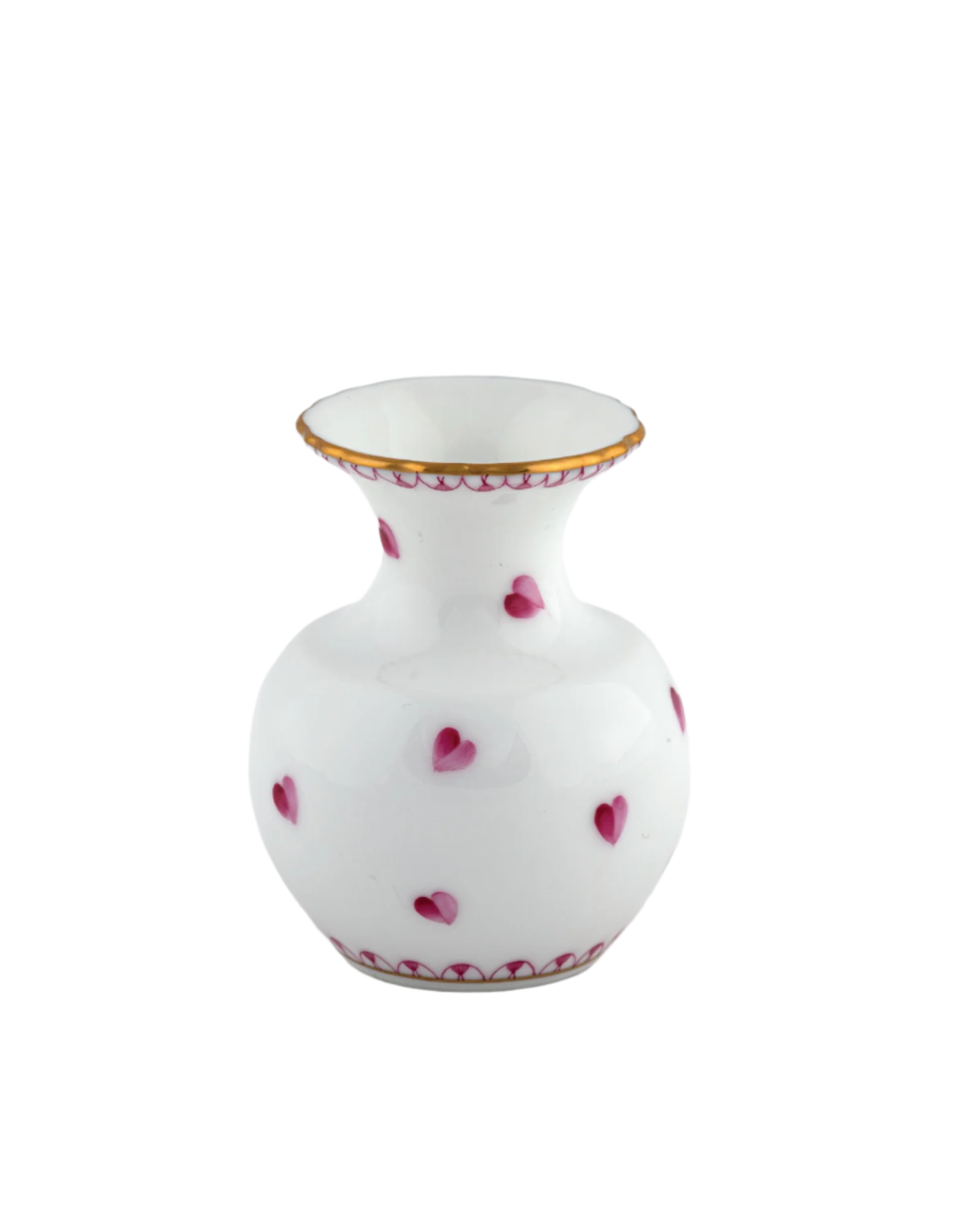 The Herend Small Heart Vase in Pink is a white ceramic vase with a wide neck, adorned with hand painted pink hearts and a gold rim, shown against a plain white background.
