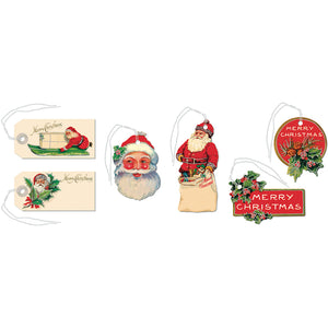 The Cavallini Papers and Co Vintage Christmas Gift Tags Tin includes six assorted vintage-style tags with Santa, holly, and “Merry Christmas” designs—some glittered for sparkle—each with a string for gifts or decoration.