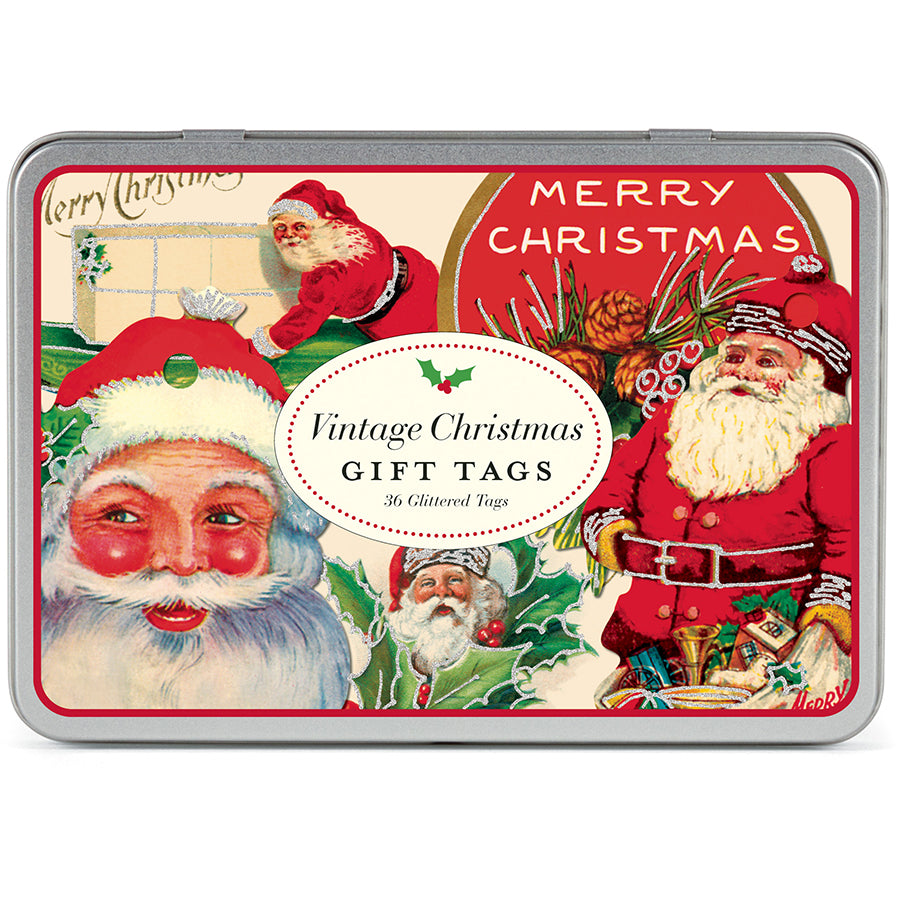 The Cavallini Papers and Co Vintage Christmas Gift Tags Tin features a rectangular tin with vintage Santa Claus illustrations and a label reading "Vintage Christmas Gift Tags – 36 Assorted Glittered Gift Tags," perfect for festive decor.