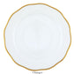 The Gwendolyn White and Gold Collection charger plate by Herend features a wavy rim, elegant white porcelain, and a 24k gold border—an ideal choice for those with refined artistic taste.
