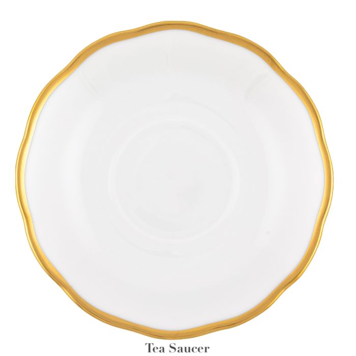The Herend Gwendolyn White and Gold Collection saucer features a scalloped 24 karat gold rim, shown from above against a white background—an elegant choice for those with an artistic eye.