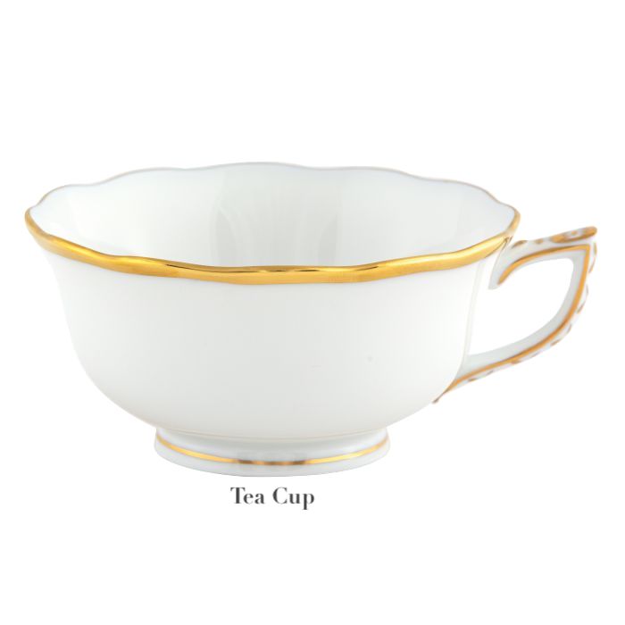 A Herend Gwendolyn White and Gold Collection porcelain tea cup with a scalloped rim and 24k gold detailing on the rim, base, and handle is set against a plain background. The label "Tea Cup" highlights its elegant design.