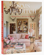 Front cover of the book “Sims Hilditch” by Rizzoli, highlighting the refined home decor and timeless interior design style of Emma Sims-Hilditch, with a decorated living room featuring patterned sofas, a coffee table, and built-in shelves.