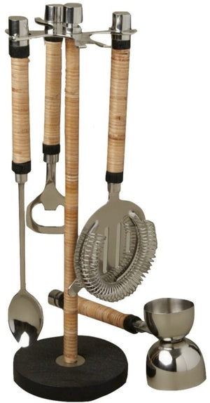 The Be Home Arendal Bar Collection features four stainless steel tools—spoon, bottle opener, strainer, and jigger—with black mango wood handles on a stand. Perfect for the master mixologist.