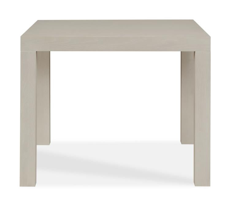 The Highland House Parsons Game Table features a square design in alabaster cerused oak with four straight legs, shown from the front against a white background.