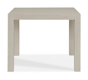 The Highland House Parsons Game Table features a square design in alabaster cerused oak with four straight legs, shown from the front against a white background.
