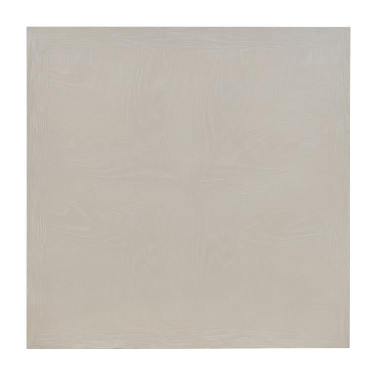 The Highland House Parsons Game Table features a square panel with a light beige alabaster cerused oak wood grain texture and subtle pattern, shown against a plain white background.