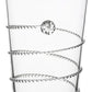 A clear tumbler from Juliska’s Amalia Drinkware Collection, featuring a textured spiral design and a raised circular accent.
