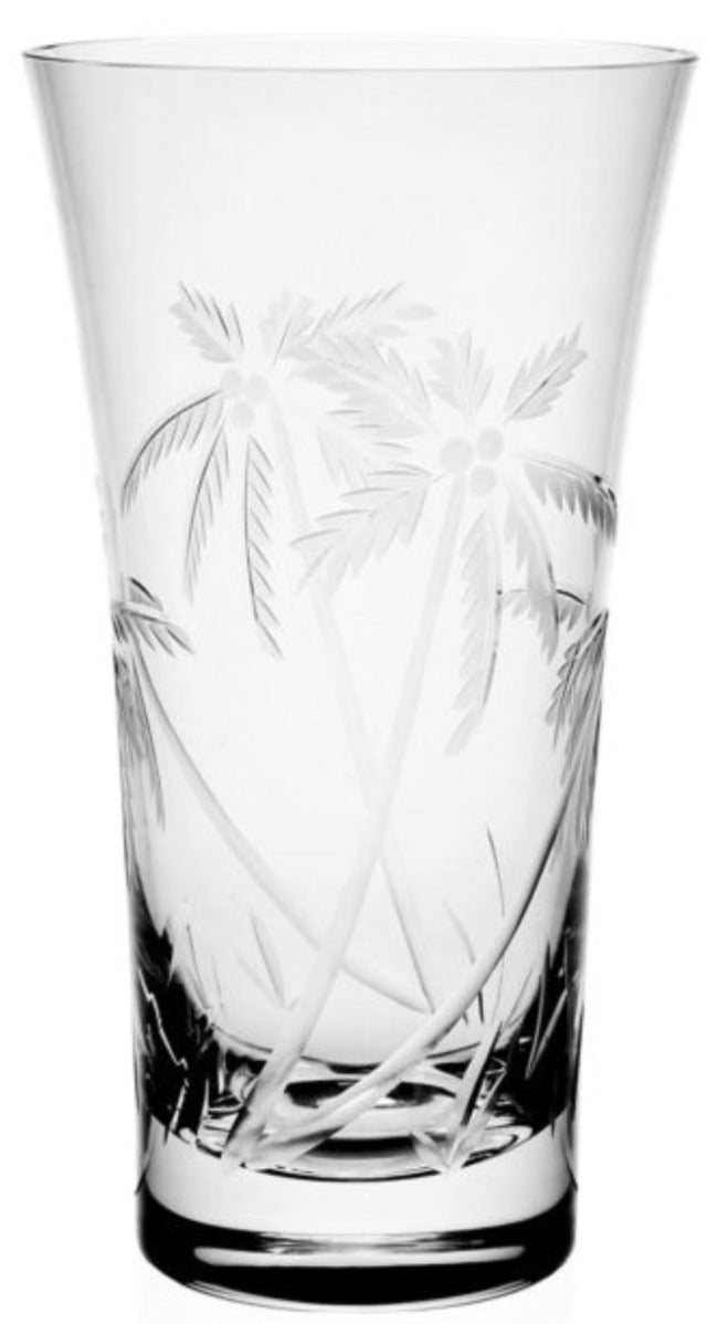 The William Yeoward Crystal Palmyra Collection vase features an etched palm tree and leaf design inspired by the lush marine environment of Palmyra Atoll.