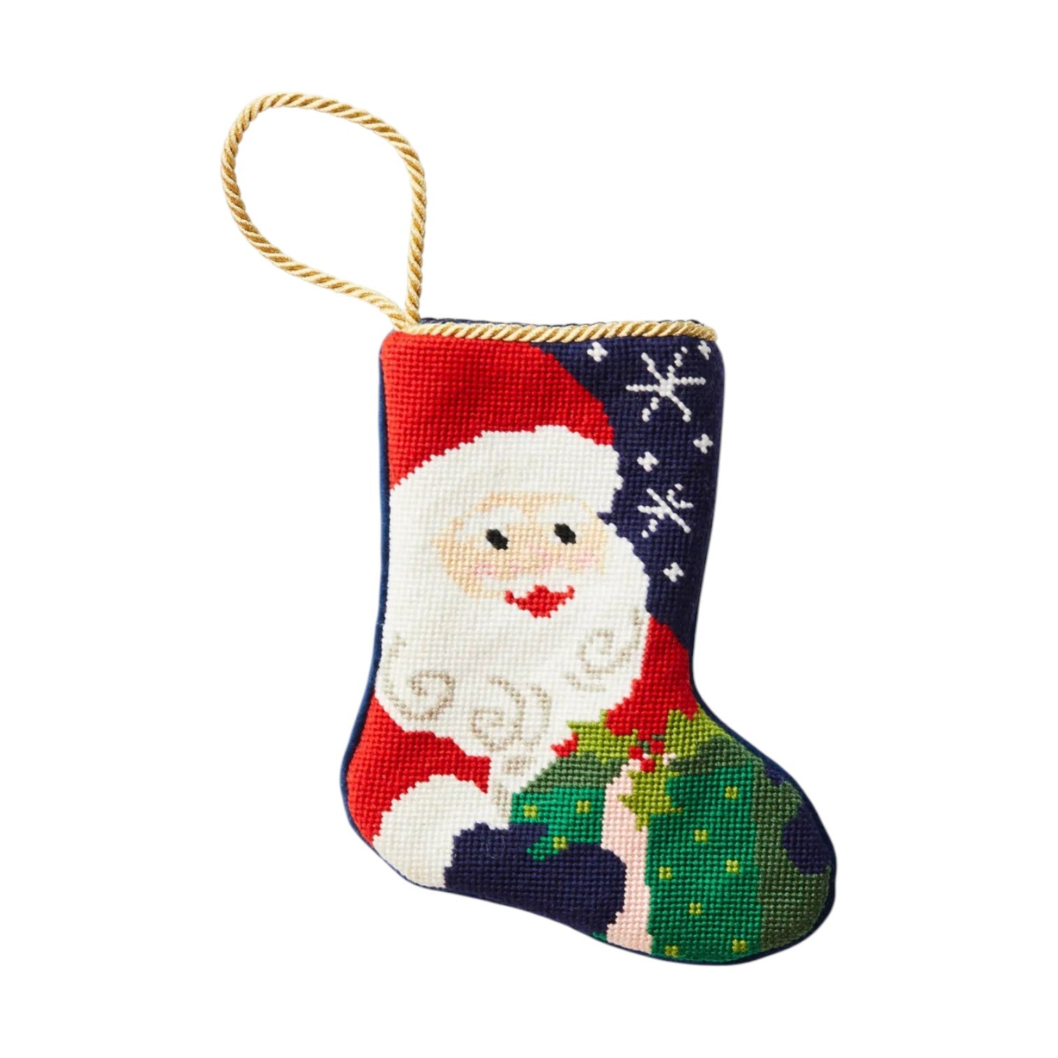 Add festive charm to your decor with the Bauble Stockings Ho Ho Ho Santa Needle Point Stocking, featuring hand-stitched Santa holding a green gift, snowflakes, and a gold hanging loop—a perfect addition to your collection.