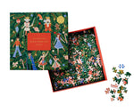 The Nutcracker Puzzle by Riffle Paper Co. is a 500-piece jigsaw in a charming illustrated box with Nutcracker Ballet nutcrackers and ballerinas; the open lid reveals mixed pieces inside and some scattered outside.