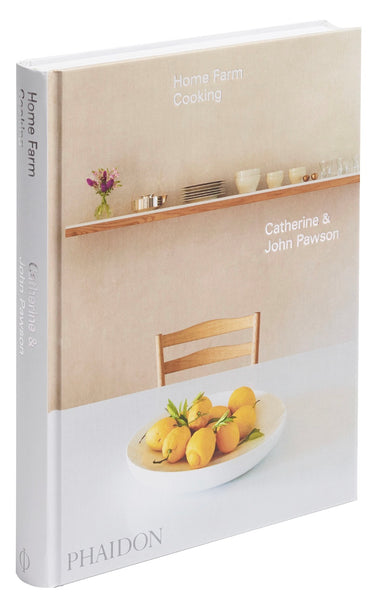 A hardcover cookbook titled "Phaidon Home Farm Cooking" by Catherine & John Pawson, displayed against a white background, is a must-have recipe collection for home cooking enthusiasts and architecture lovers.