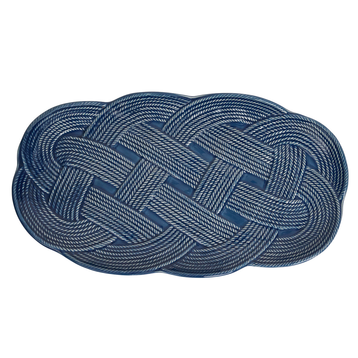 Juliska Le Panier Mystic Knot Denim oval ceramic serving platter, featuring a blue and white knot pattern, shown from above on a white background.