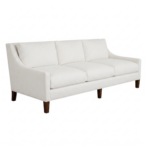 A white Chatham Sofa by Hickory Chair, featuring three seats, straight armrests, and wooden legs—its design evokes the sophisticated comfort of a classic English club chair. Set against a plain white background, this piece introduces understated hints of Chatham elegance to interiors inspired by West Palm Beach style.