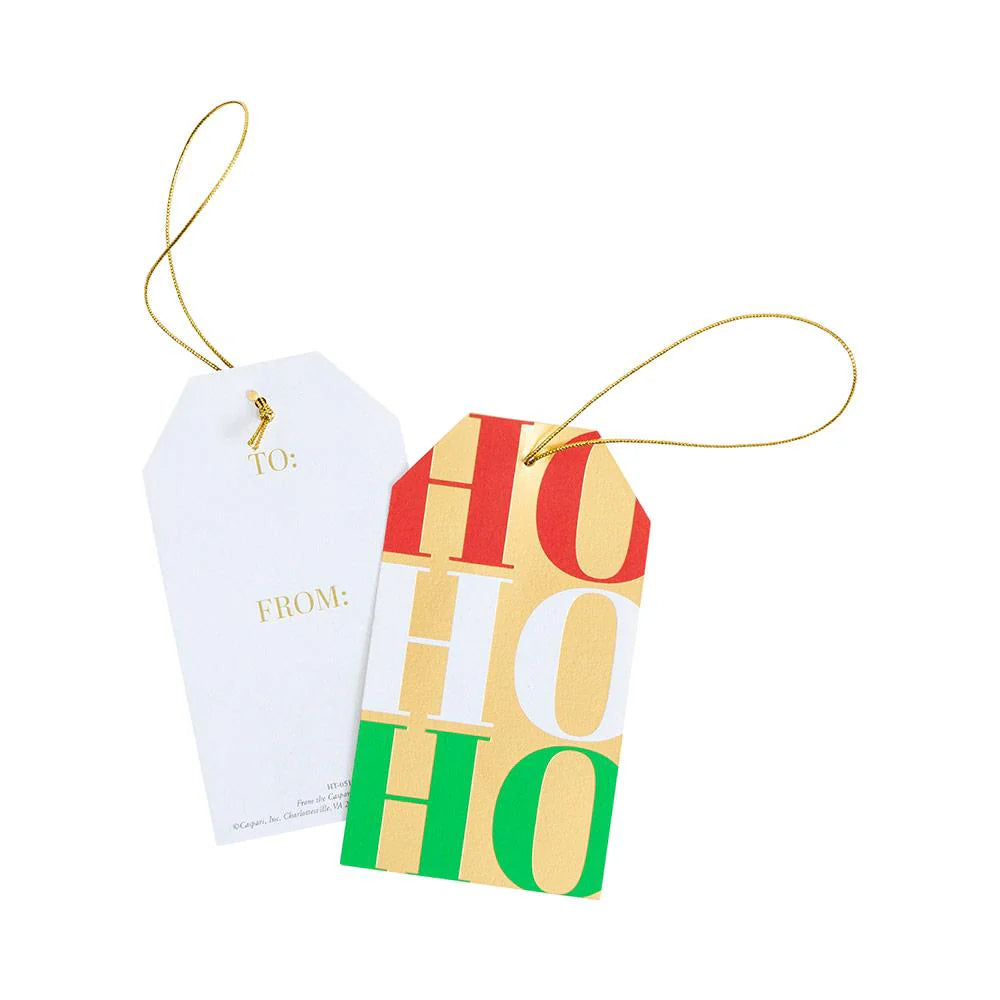 The Caspari Ho Ho Ho Gift Tag Set includes two die-cut tags with gold strings: one has "TO:" and "FROM:" in gold, the other shows "HO HO HO" in red, green, and gold—ideal festive ornaments for holiday gifts.