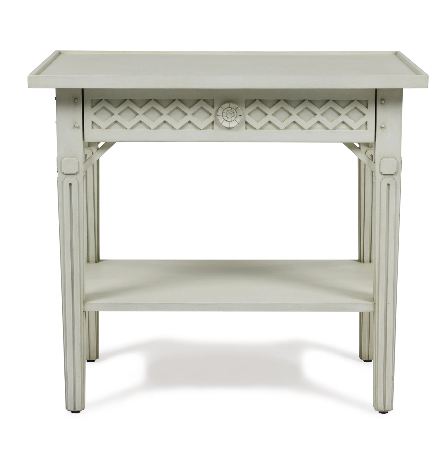 The Inge Side Table by Bunny Williams features a white wooden frame, decorative lattice design, lower storage shelf, and a charming hand-painted Swedish finish.