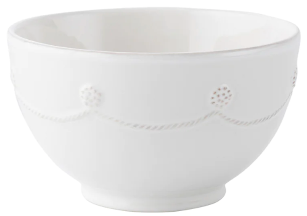 A white ceramic pasta bowl from the Juliska Berry & Thread Classic Whitewash Dinnerware Collection, featuring a raised dot and scalloped line design near the rim, is shown against a plain background.