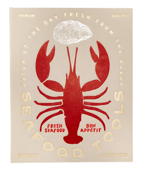 A beige sign with a large red lobster illustration, featuring "Fresh Seafood," "Bon Appétit," and "PrintWorks Seafood Tool Set"—including Shell Crackers and Oyster Knives—in gold lettering.